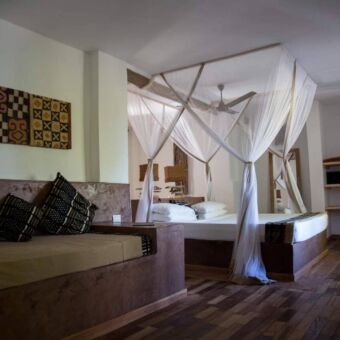 Slaapkamer bij Uzuri Villa