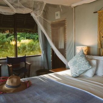 Mooi opgemaakt bed in de accommodatie Lazy Lagoon